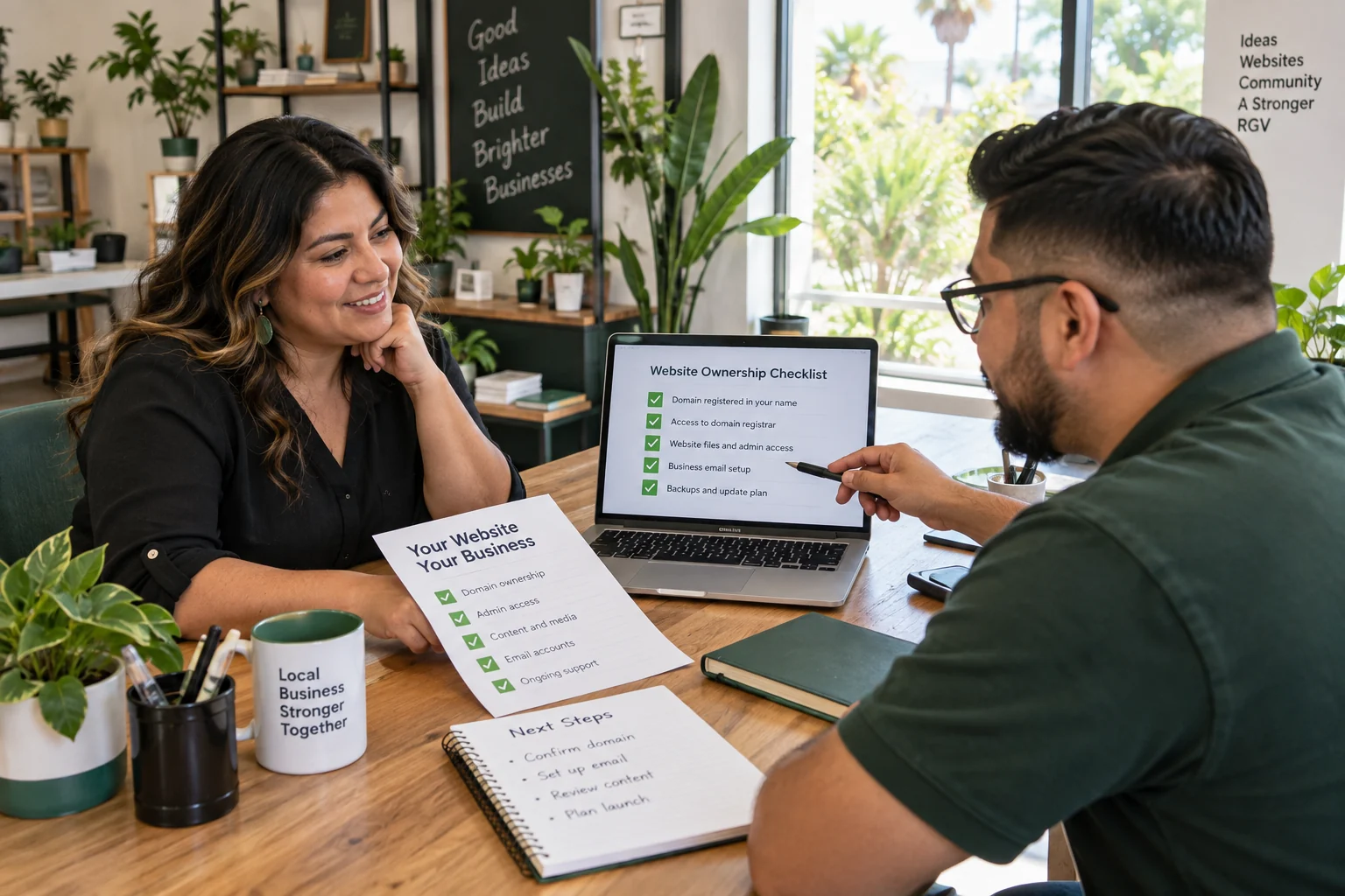 Rio Grande Valley business owner reviewing domain ownership details with a local web professional